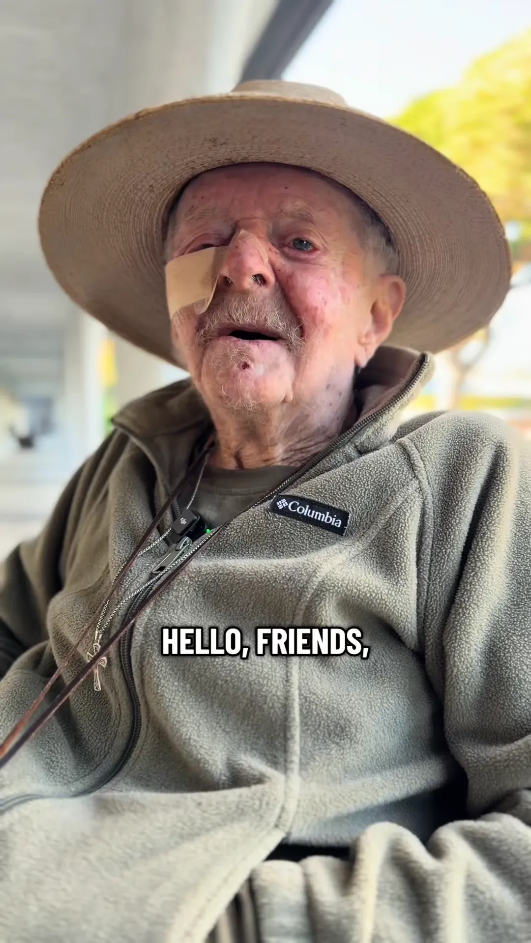 Uncle Jack, in a wide-brimmed hat and a fleece jacket, speaks to the camera, captioned “Hello, friends,”.